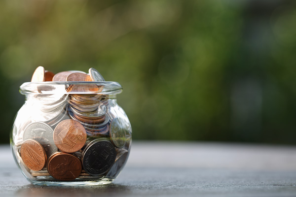 Coins in a glass bowl