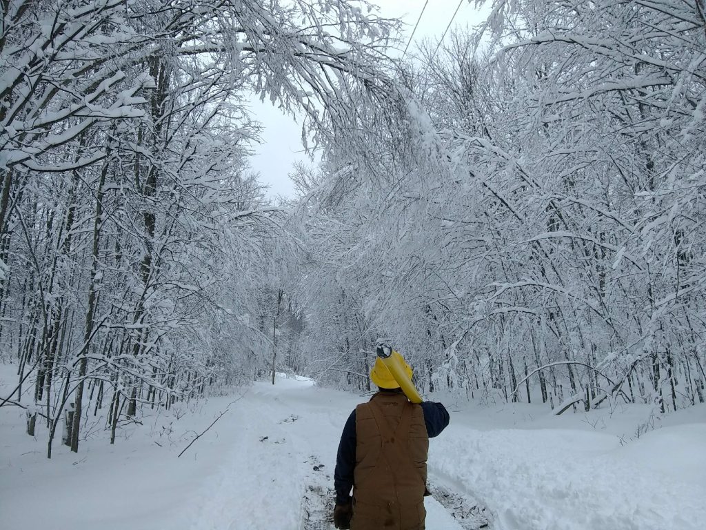 Lineman in snow and ice