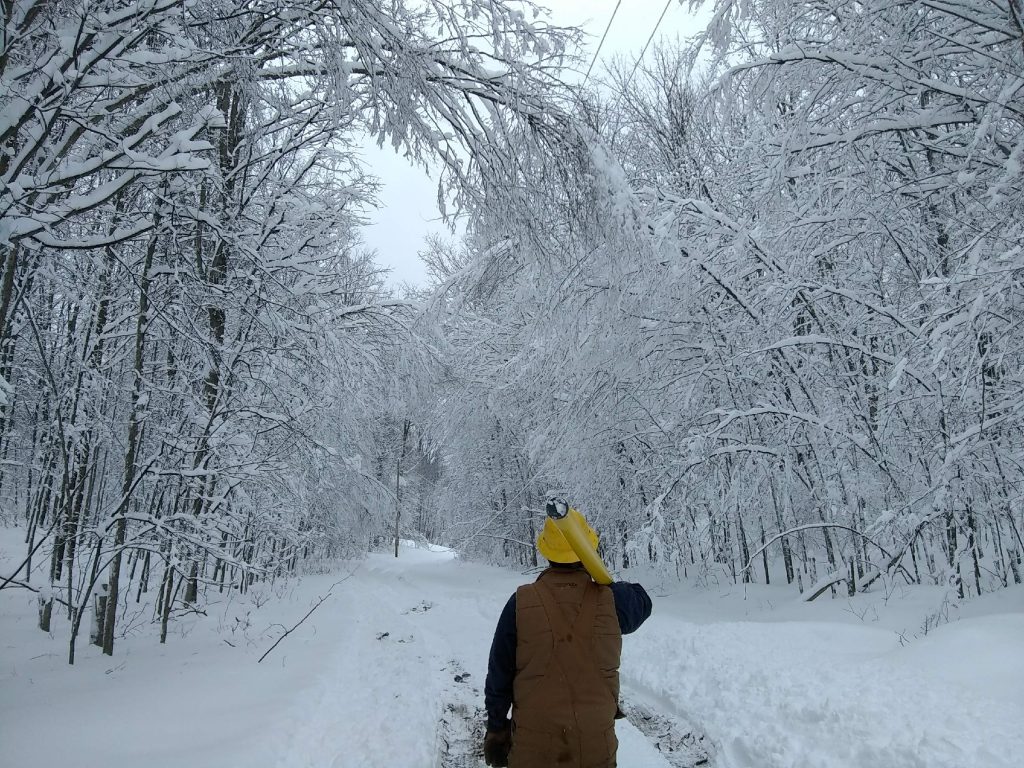 Lineman in snow and ice