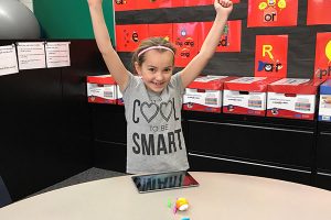 Classroom Grant photo - student in It's Cool to be Smart t-shirt