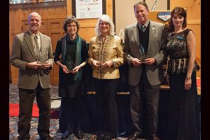 GLE CEO Bill Scott accepts Boyne Area Chamber's Sally Roselli Business Leadership Award