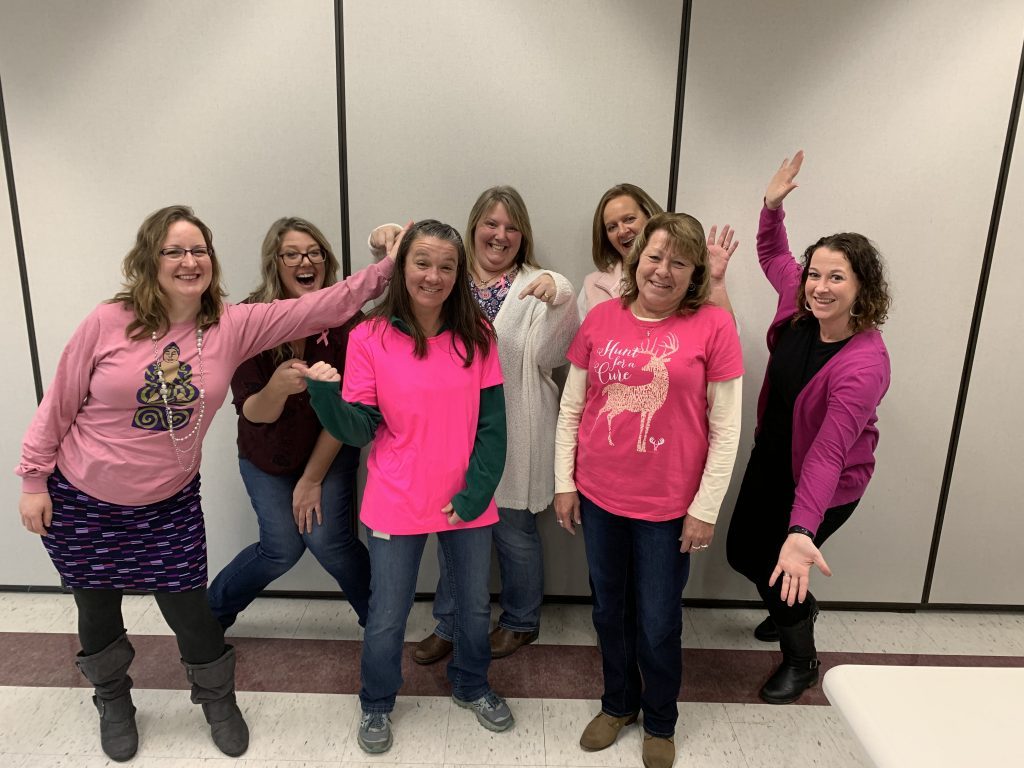 ladies wearing pink for Fight Cancer Day