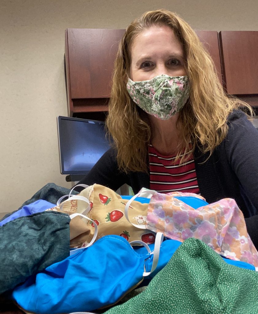 GLE employee with Amish-made masks