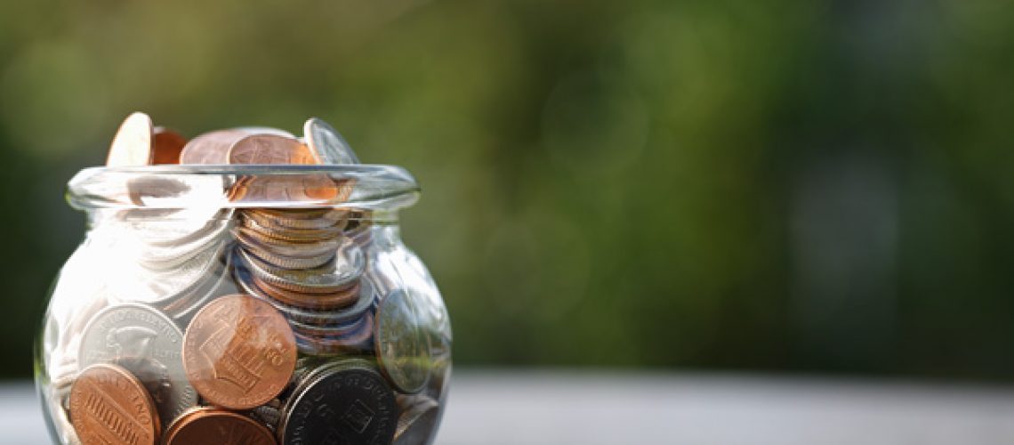 DonationPhoto Coins in a glass bowl