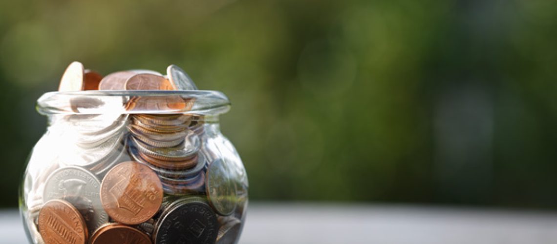 DonationPhoto Coins in a glass bowl