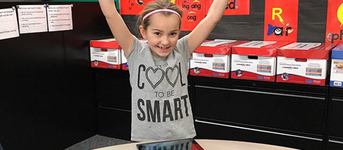 Classroom Grant photo - student in It's Cool to be Smart t-shirt